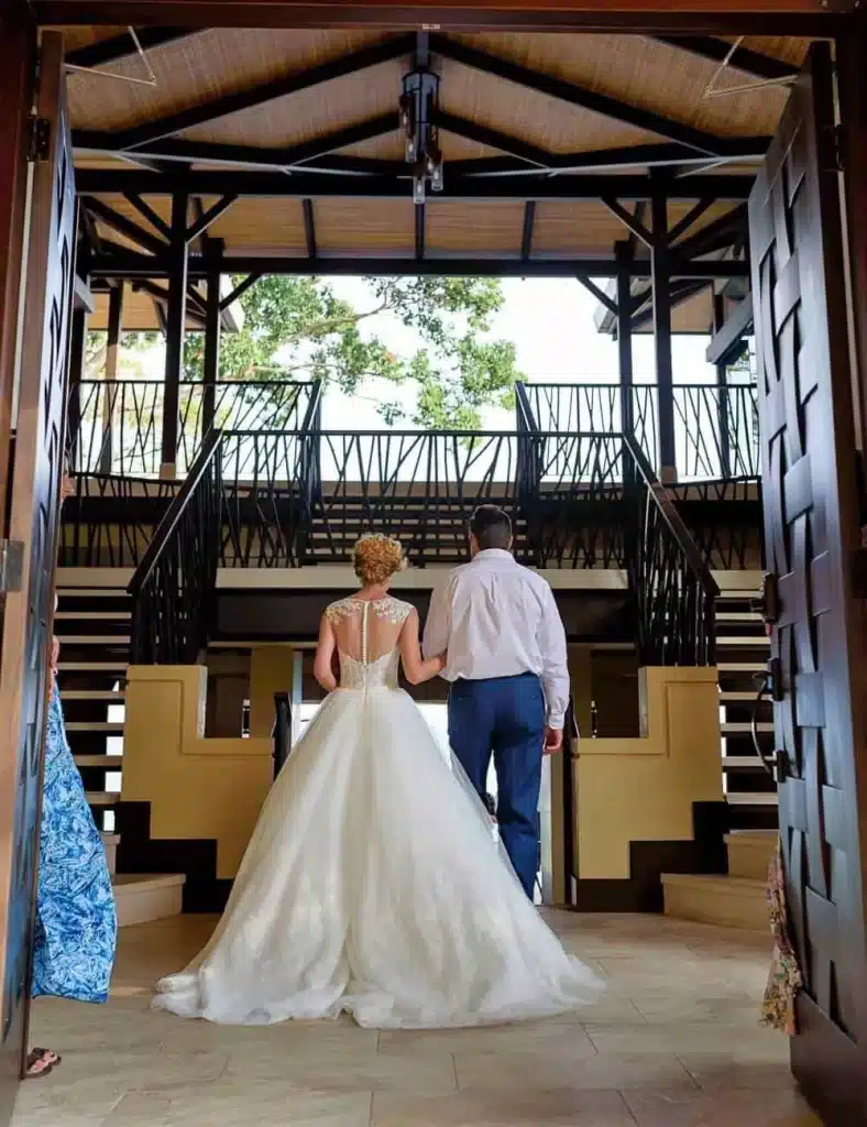 Costa Rica wedding with father walking daughter to her destination wedding ceremony at Vista Hermosa Estate