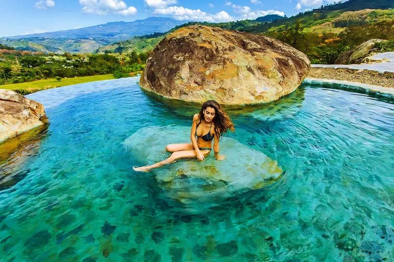 Incredible view from a pool at Hacienda Orosi Natural Spa & Hot Springs