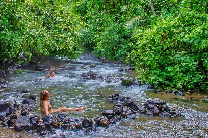 People enjoying La Fortuna Hot Springs